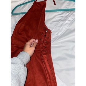 Suede dress, tie sides and zip in back.